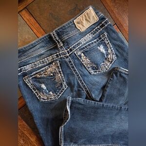 Silver Suki embroidered pocket flare/bootcut jeans with sequins; size 26 × 32